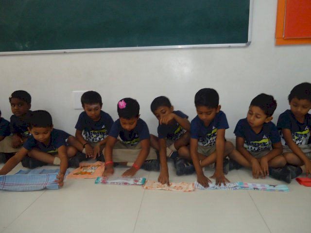 Napkin folding : Napkin folding is a form of art. It is a life skill activity,which we use in day  -to - day life.Children learnt to fold napkins beautifully and they enjoyed the activity - Bumble Bees
